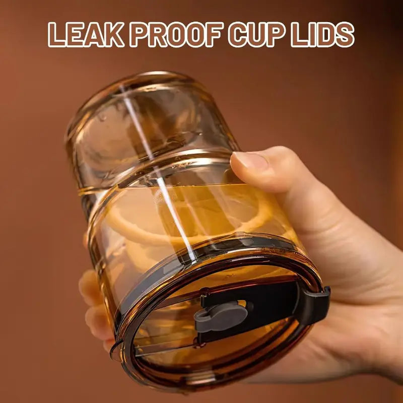 Over glass water bottle with straw